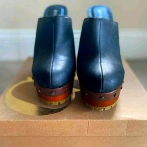Heeled clogs